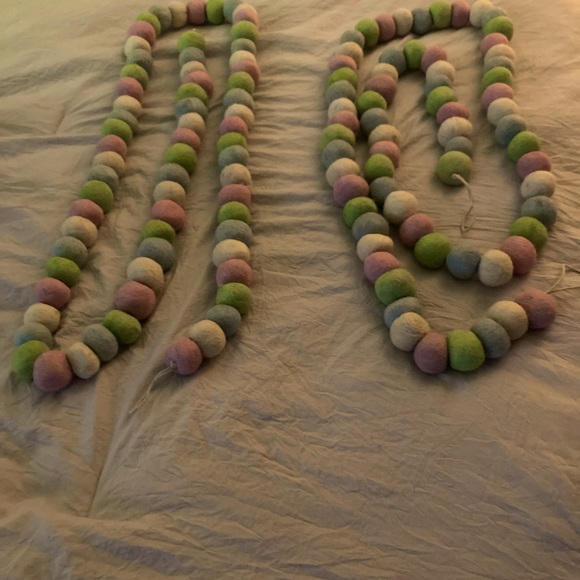2 strings of pastel wool balls.  Excellent for a large glass bowl in a nursery. - Picture 1 of 2